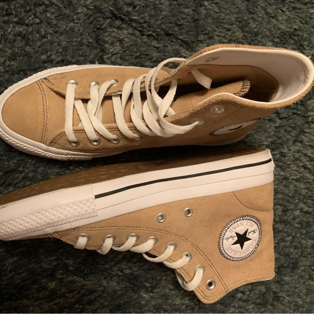 Tan converse.